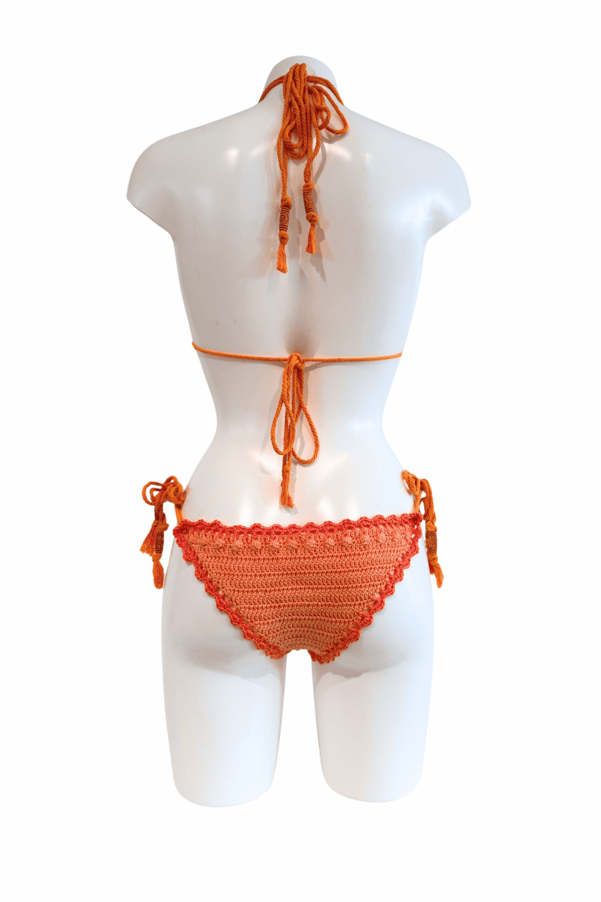 Orange Mandarin luxury crochet bikini, designed and handmade in Switzerland by RA LIVING – exclusive designer beachwear and swimwear for a stylish summer look.