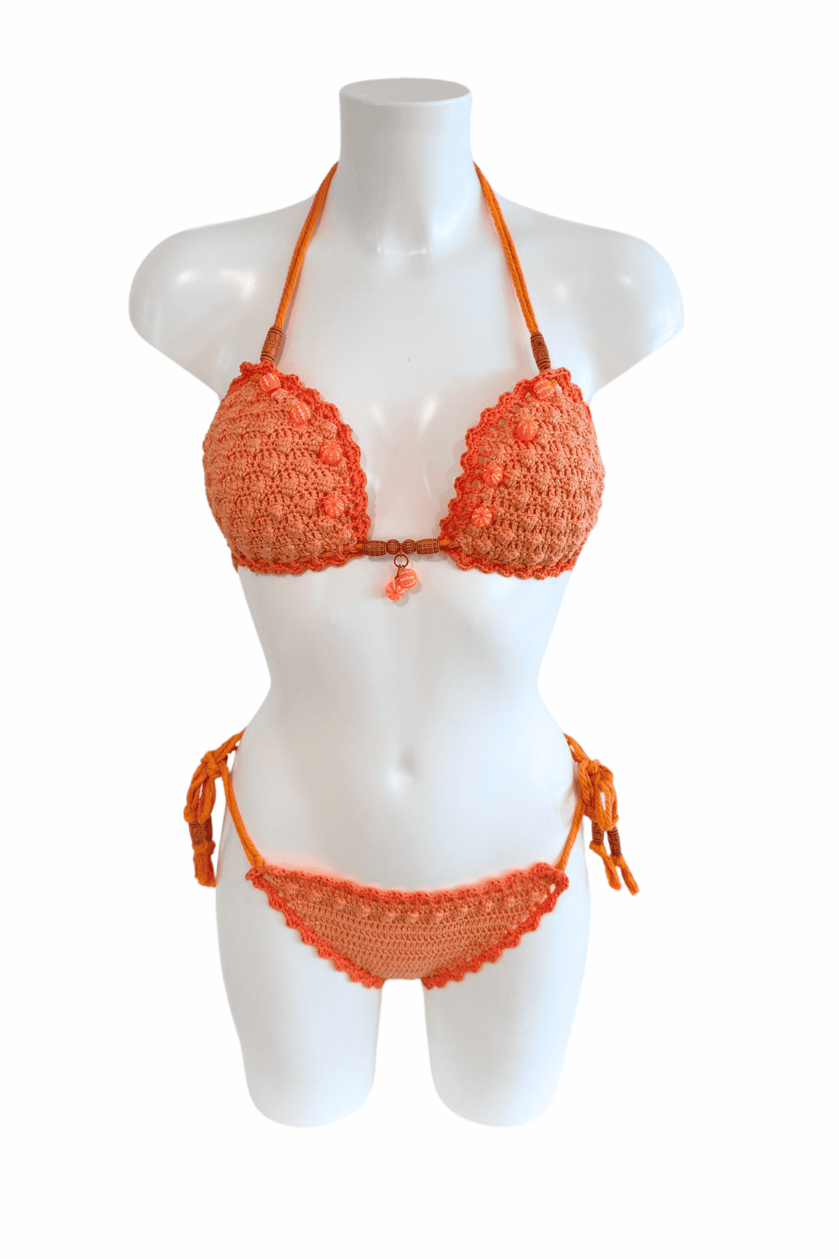 Orange Mandarine luxury crochet bikini, designed and handmade in Switzerland by RA LIVING – exclusive designer beachwear and swimwear for a stylish summer look.