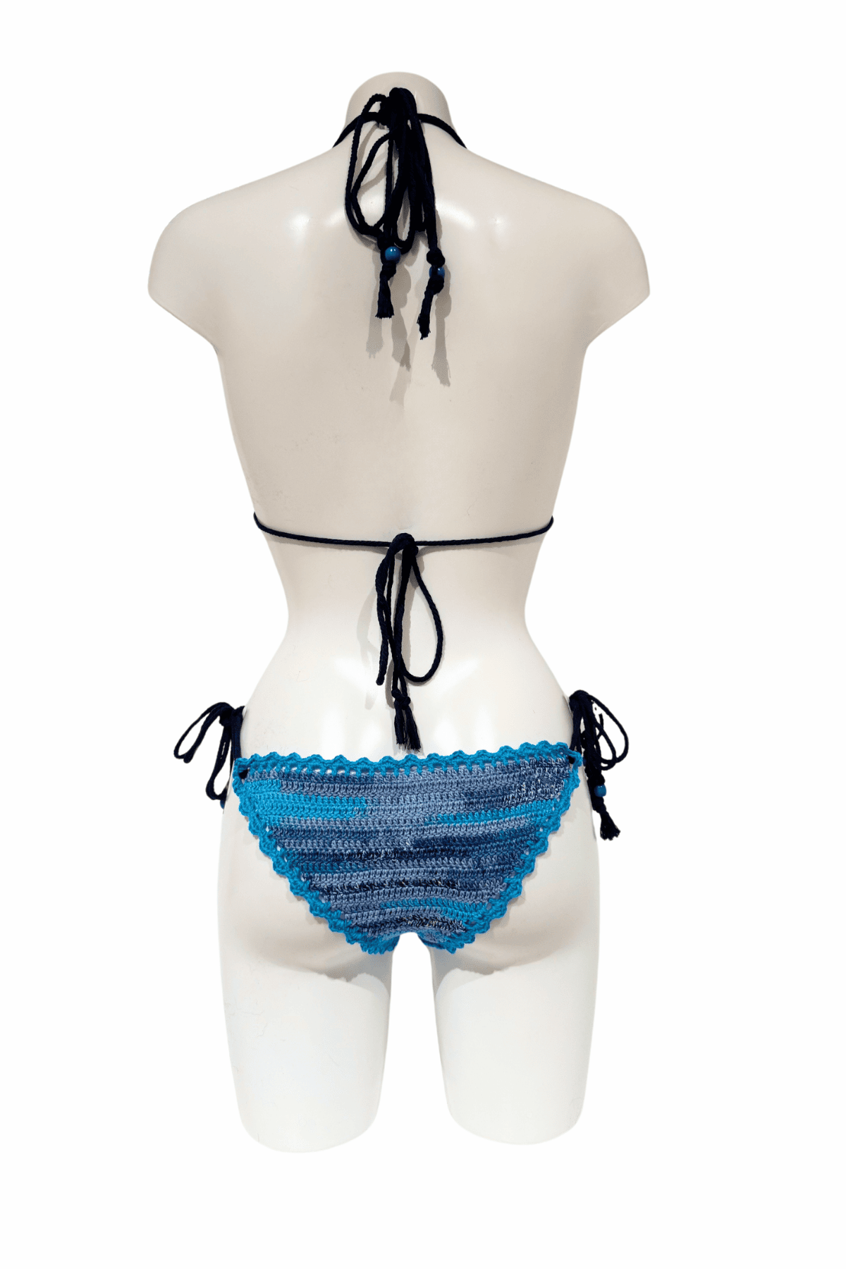 Blue evil eye luxury crochet bikini, designed and handmade in Switzerland by RA LIVING – exclusive designer beachwear and swimwear for a stylish summer look.