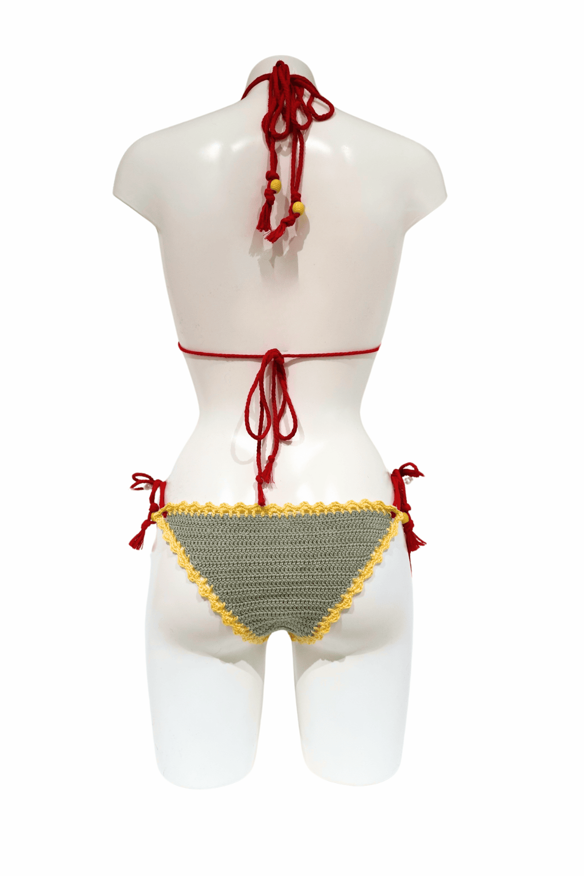 Yellow Smiley Heart luxury crochet bikini, designed and handmade in Switzerland by RA LIVING – exclusive designer beachwear and swimwear for a stylish summer look.
