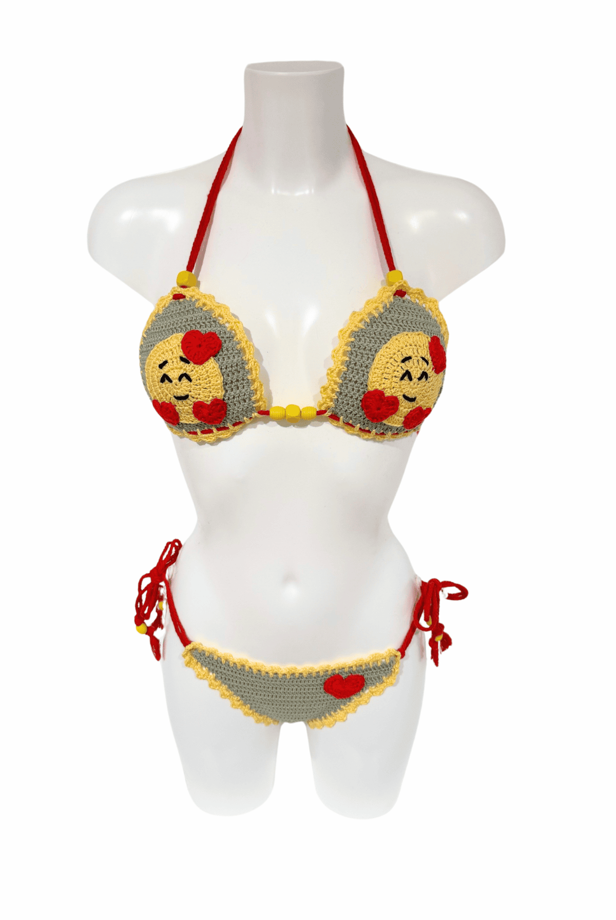 Yellow Smiley Heart luxury crochet bikini, designed and handmade in Switzerland by RA LIVING – exclusive designer beachwear and swimwear for a stylish summer look.