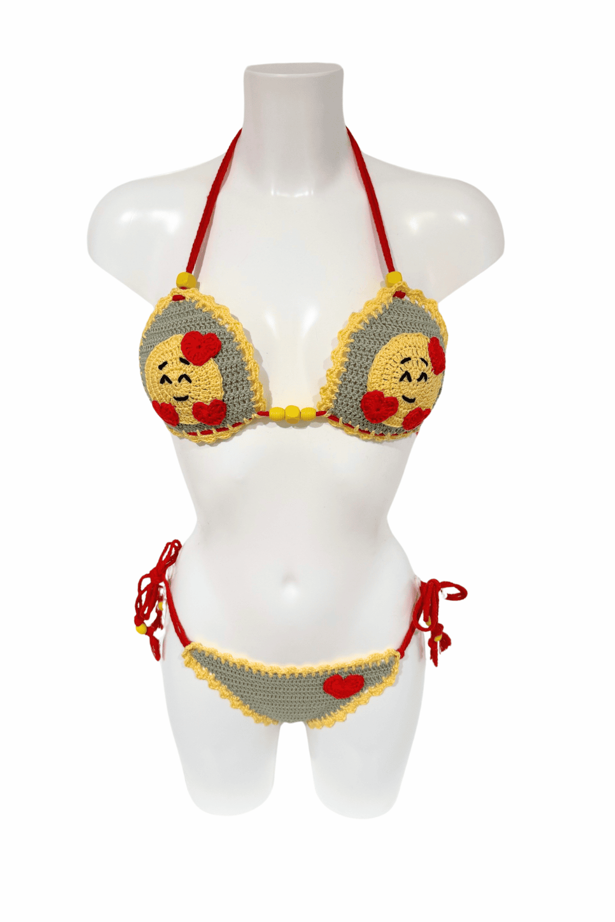 Yellow Smiley Heart luxury crochet bikini, designed and handmade in Switzerland by RA LIVING – exclusive designer beachwear and swimwear for a stylish summer look.
