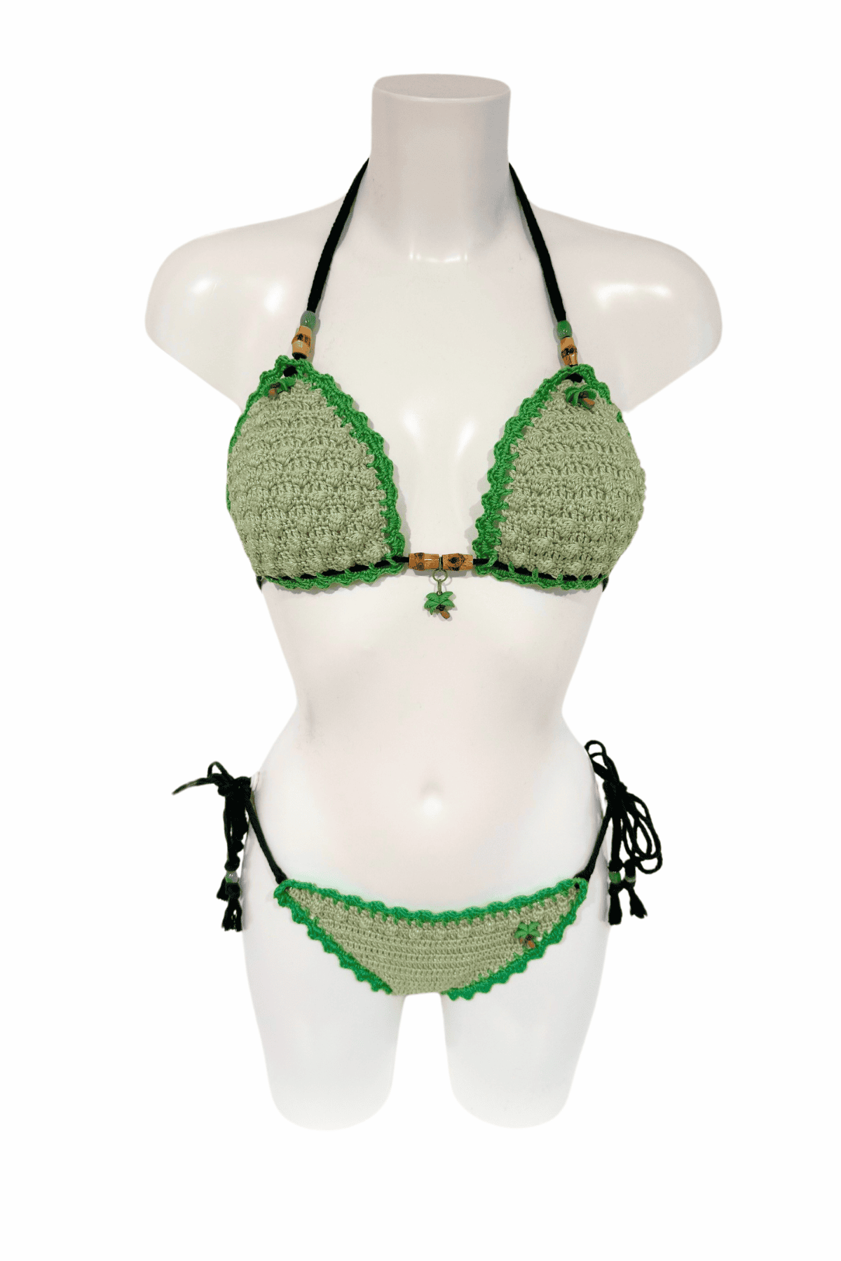 Green luxury crochet bikini, designed and handmade in Switzerland by RA LIVING – exclusive designer beachwear and swimwear for a stylish summer look.