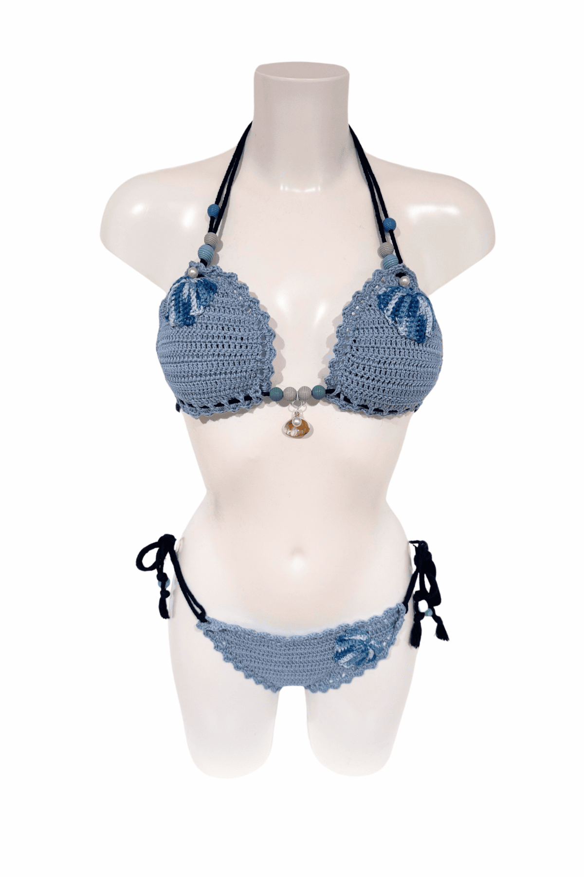 Blue Pearl Shell luxury crochet bikini, designed and handmade in Switzerland by RA LIVING – exclusive designer beachwear and swimwear for a stylish summer look.