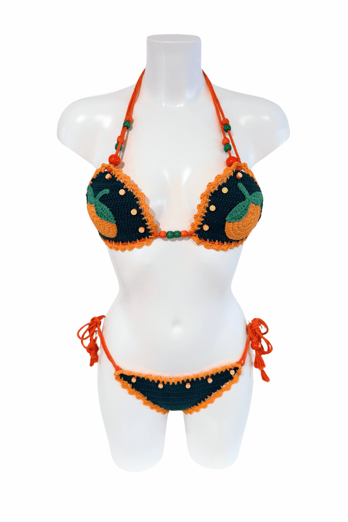 Orange Green luxury crochet bikini, designed and handmade in Switzerland by RA LIVING – exclusive designer beachwear and swimwear for a stylish summer look.