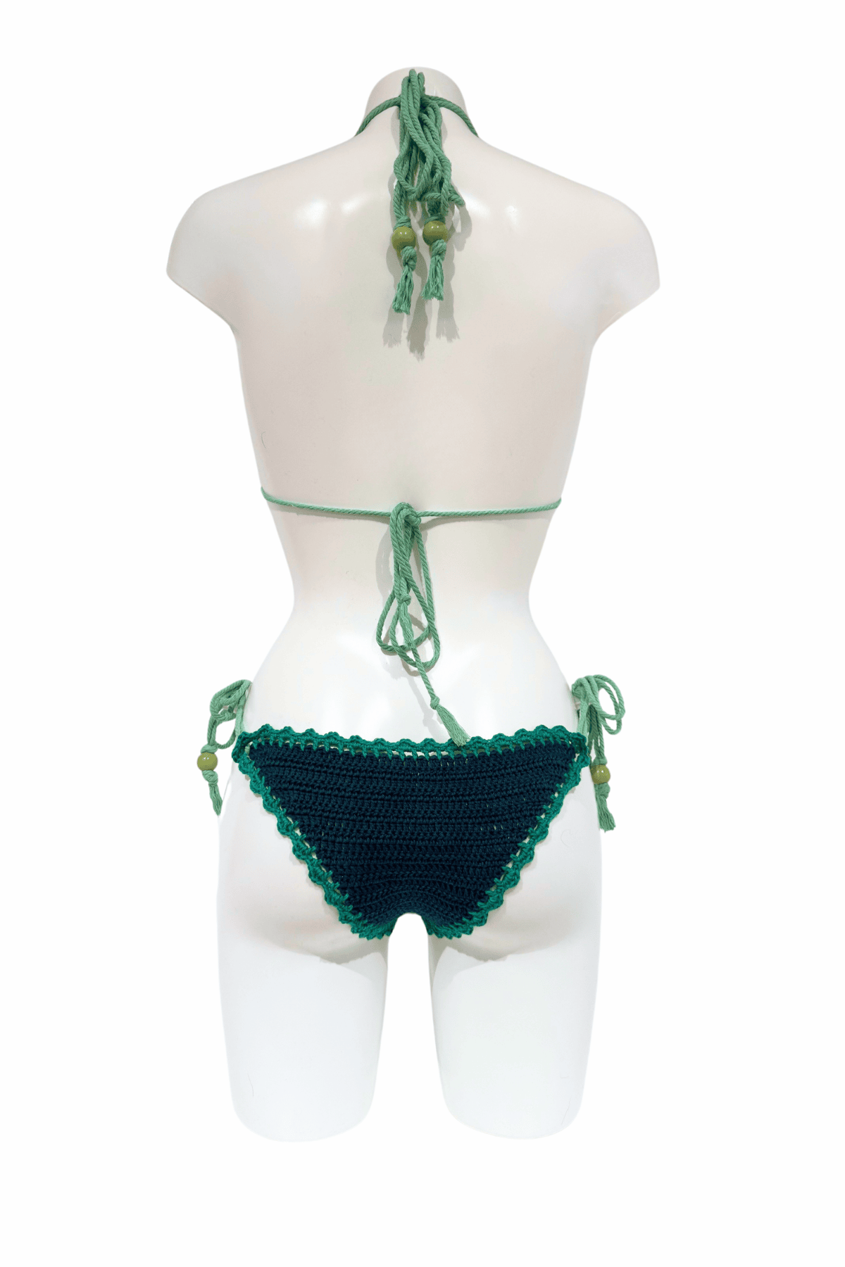 Green Pear luxury crochet bikini, designed and handmade in Switzerland by RA LIVING – exclusive designer beachwear and swimwear for a stylish summer look.