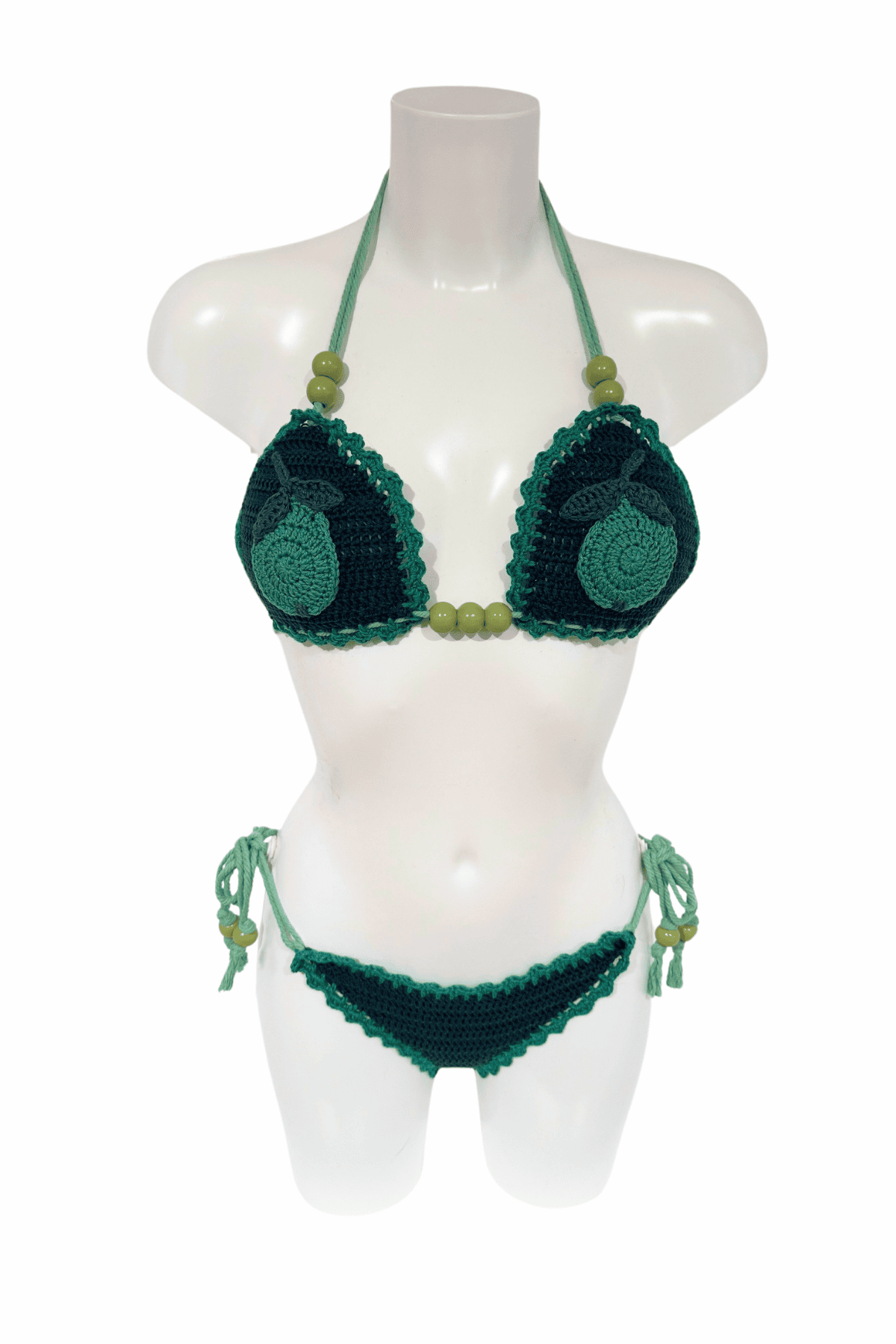 Green Pear luxury crochet bikini, designed and handmade in Switzerland by RA LIVING – exclusive designer beachwear and swimwear for a stylish summer look.
