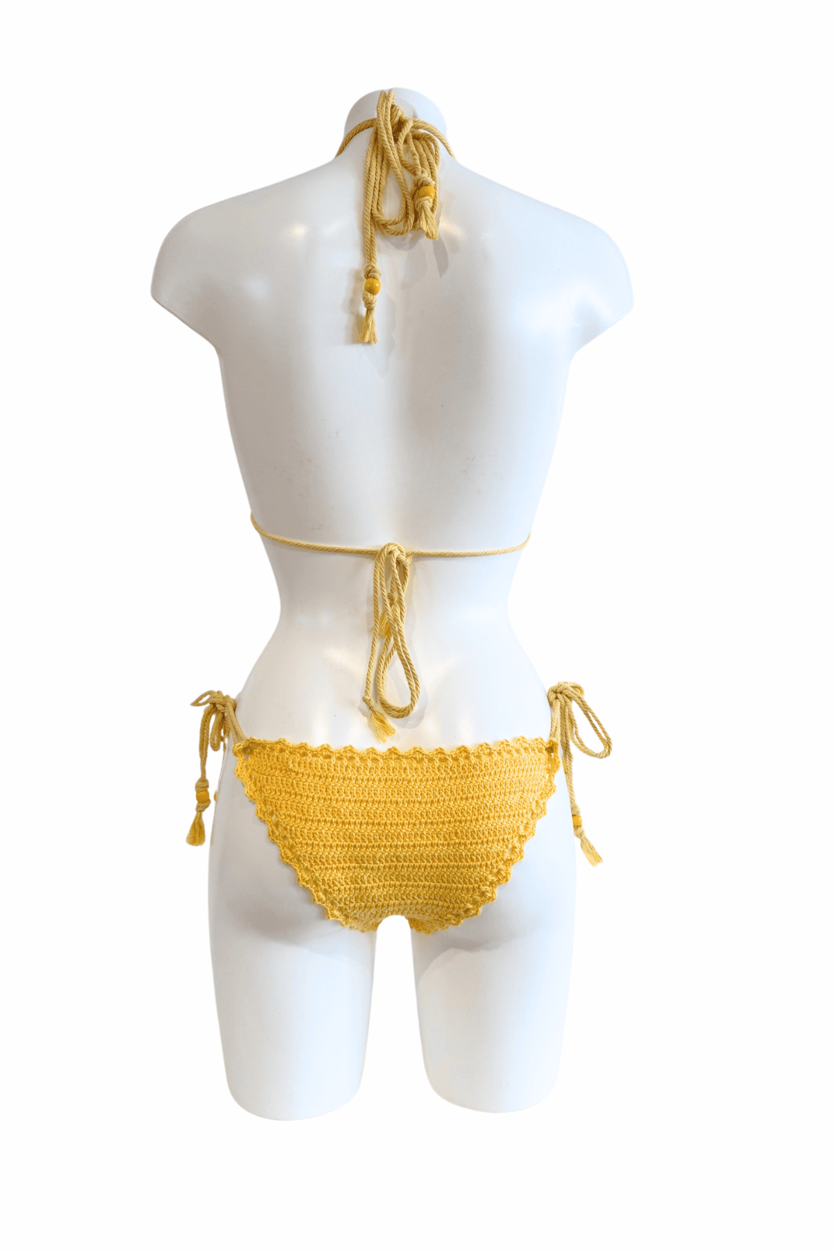 Sunshine luxury crochet bikini, designed and handmade in Switzerland by RA LIVING – exclusive designer beachwear and swimwear for a stylish summer look.
