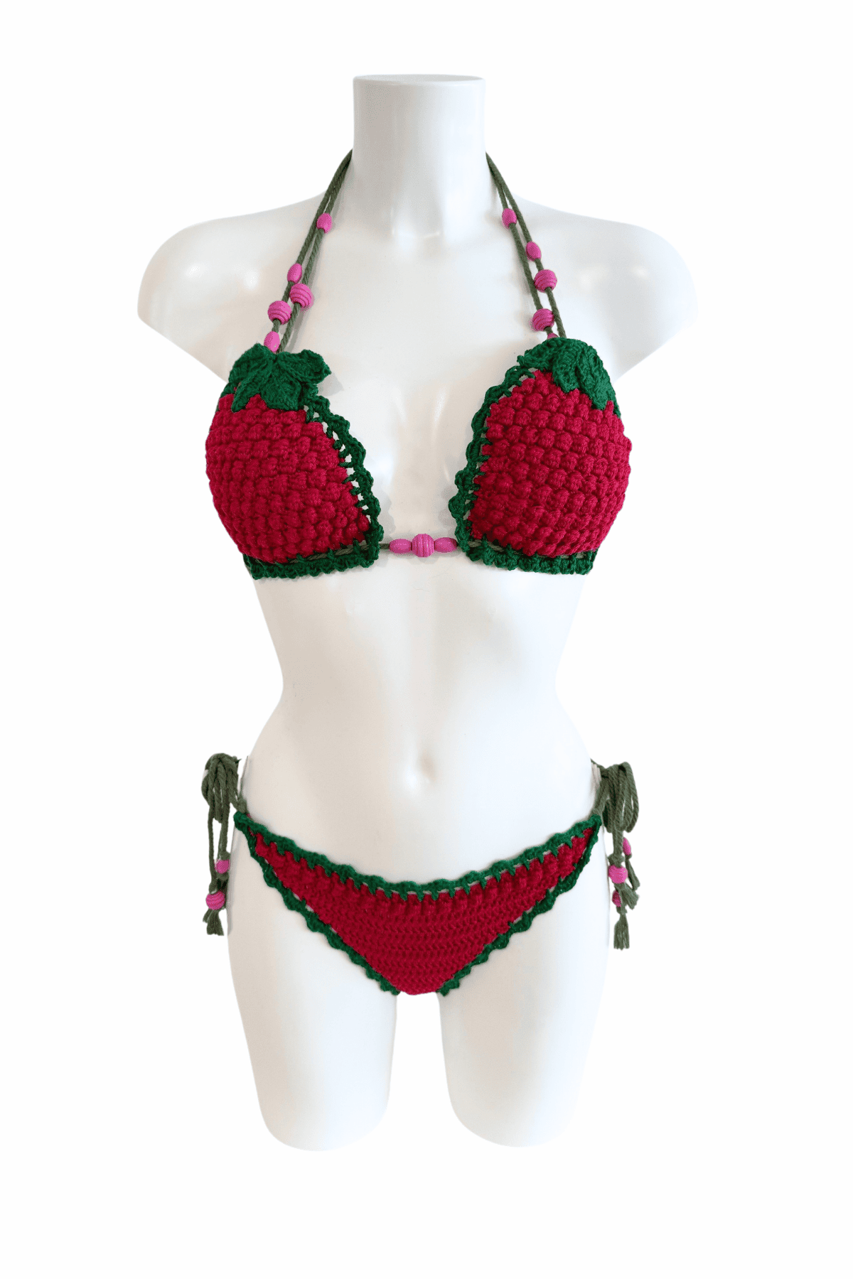 Raspberry luxury crochet bikini, designed and handmade in Switzerland by RA LIVING – exclusive designer beachwear and swimwear for a stylish summer look.