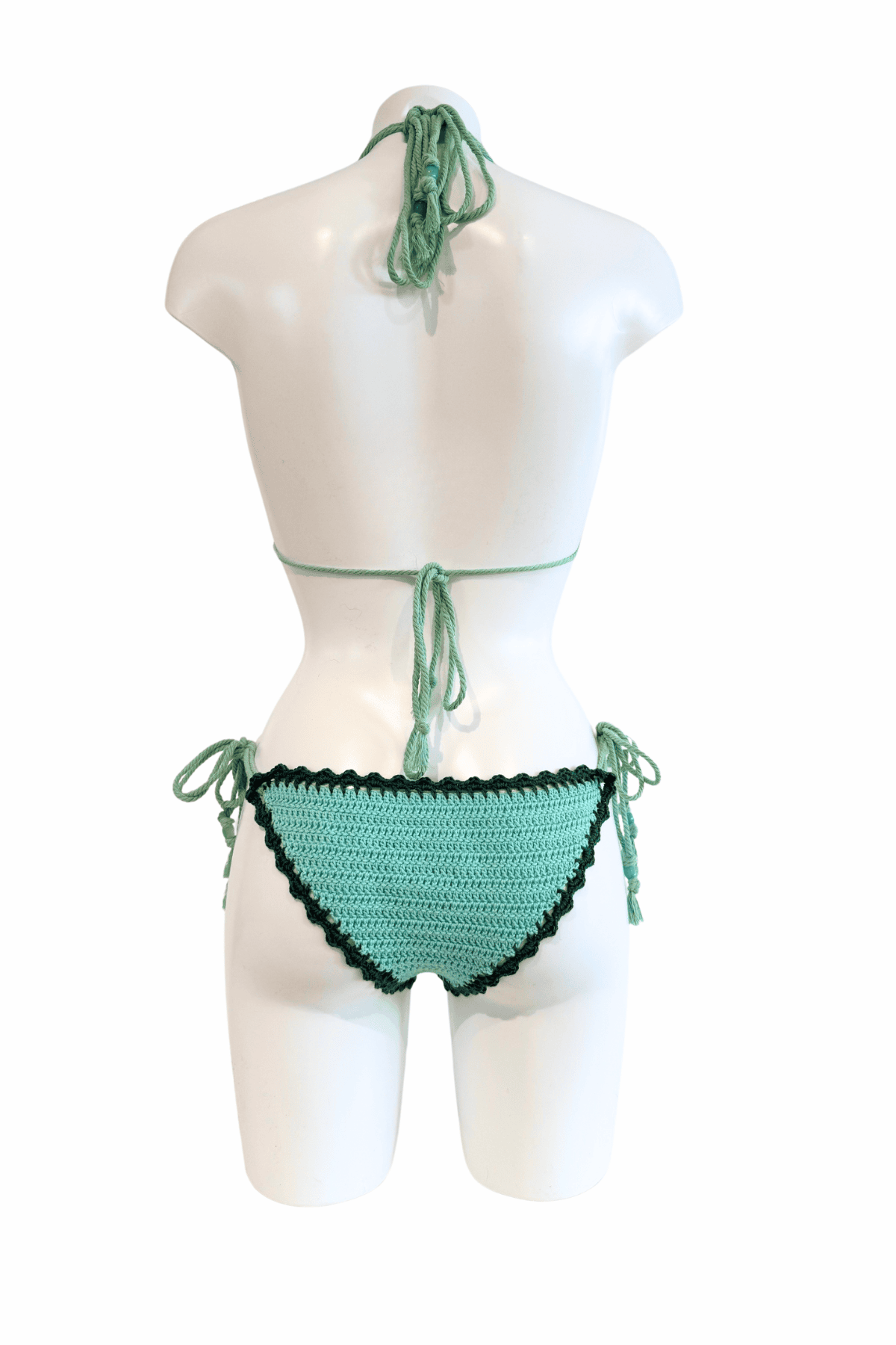 Green Fish luxury crochet bikini, designed and handmade in Switzerland by RA LIVING – exclusive designer beachwear and swimwear for a stylish summer look.