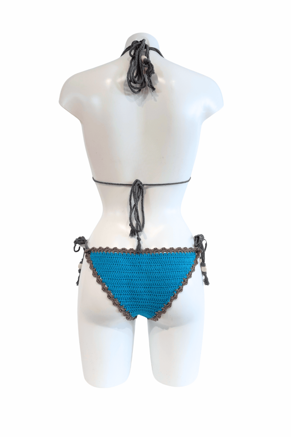 Dolphin luxury crochet bikini, designed and handmade in Switzerland by RA LIVING – exclusive designer beachwear and swimwear for a stylish summer look.