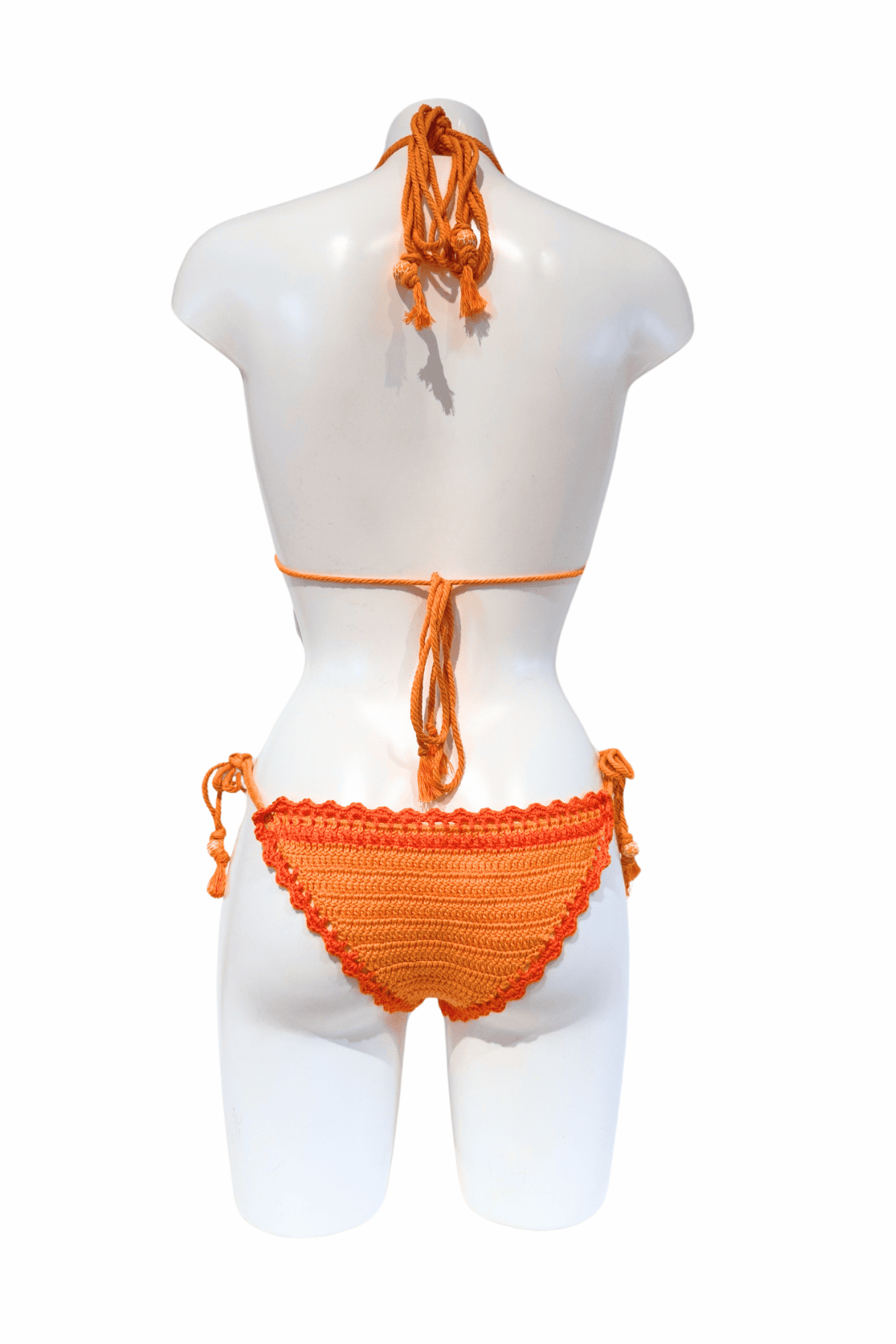 Orange Striped luxury crochet bikini, designed and handmade in Switzerland by RA LIVING – exclusive designer beachwear and swimwear for a stylish summer look.