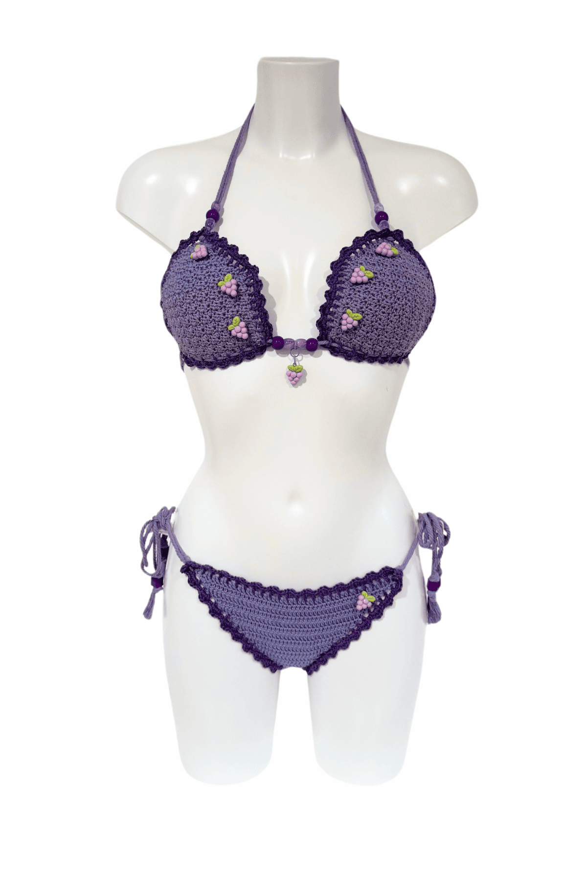 Lila Grape luxury crochet bikini, designed and handmade in Switzerland by RA LIVING – exclusive designer beachwear and swimwear for a stylish summer look.