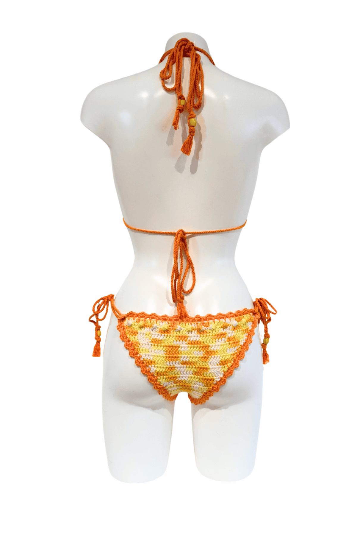 Yellow Orange Carrot luxury crochet bikini, designed and handmade in Switzerland by RA LIVING – exclusive designer beachwear and swimwear for a stylish summer look.