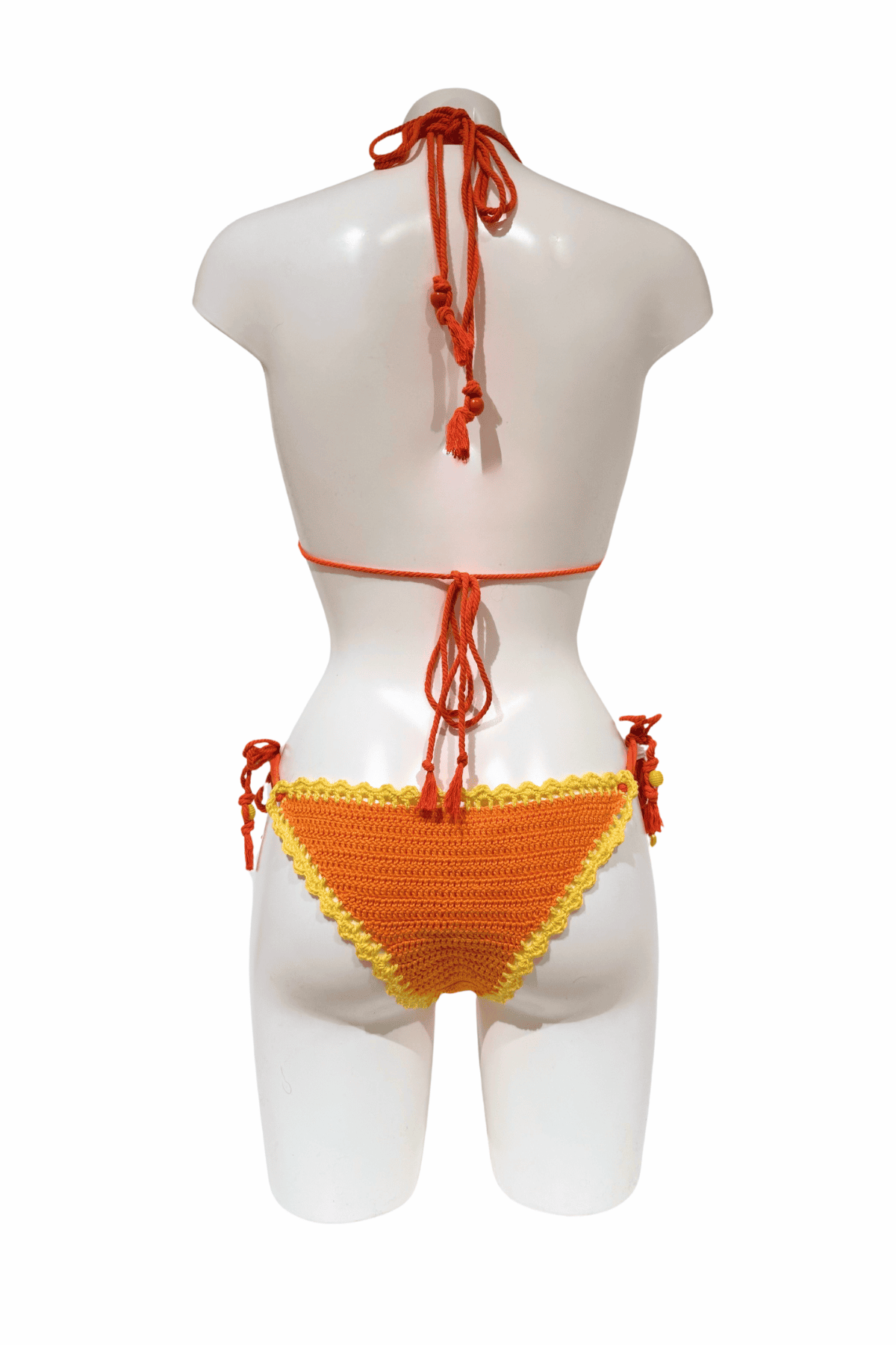 Orange Yellow Lollipop luxury crochet bikini, designed and handmade in Switzerland by RA LIVING – exclusive designer beachwear and swimwear for a stylish summer look.