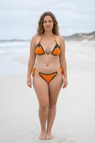 Clementines crochet bikini on a curvy model, front view - RA LIVING, handmade in Switzerland