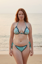 Cucumber crochet bikini on a curvy model, front view - RA LIVING, handmade in Switzerland