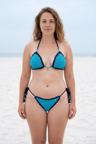 Eyes on You crochet bikini on a curvy model, front view - RA LIVING, handmade in Switzerland