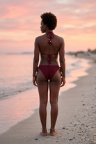 Golden Girl crochet bikini on model, back view - RA LIVING, handmade in Switzerland