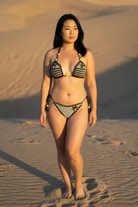 Lemon Ice crochet bikini on a curvy model, front view - RA LIVING, handmade in Switzerland