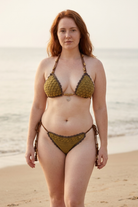 Mykonos Now crochet bikini on a curvy model, front view - RA LIVING, handmade in Switzerland