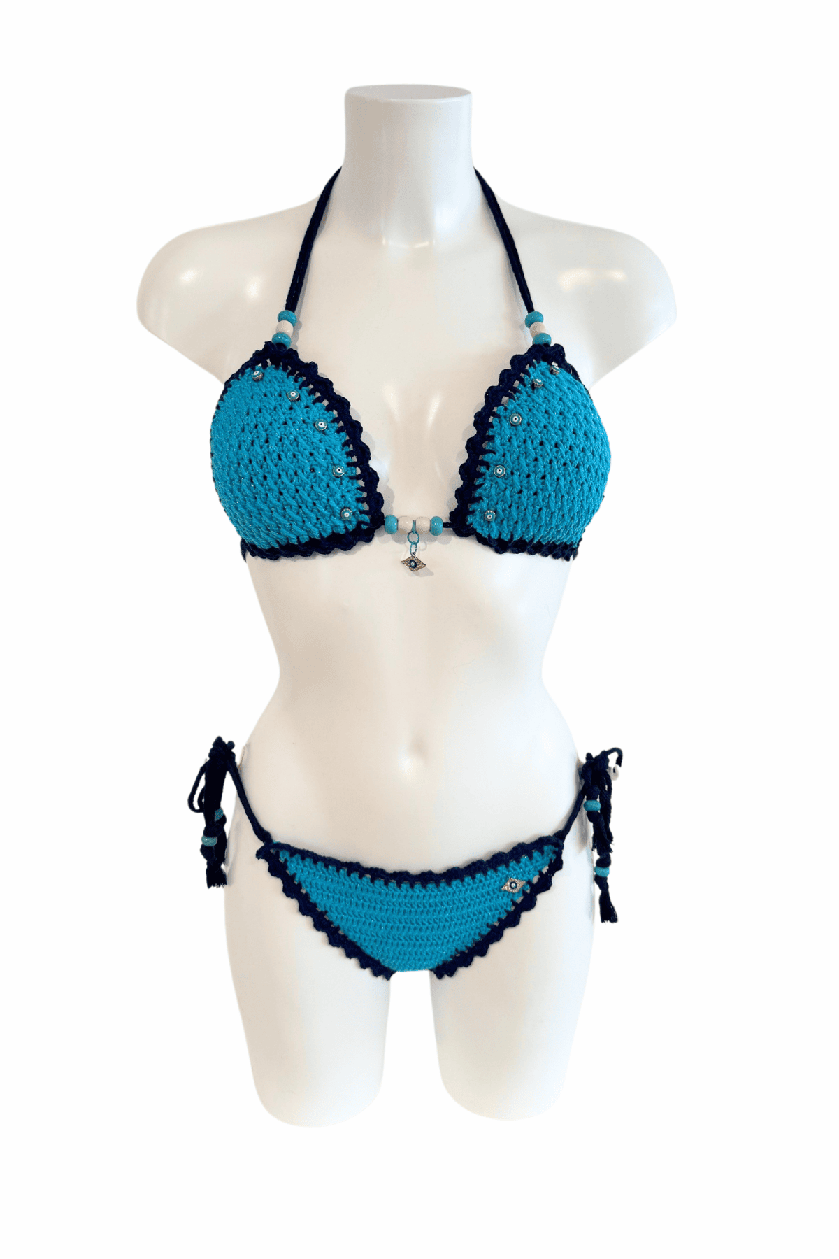 Classic Blue Evil Eye luxury crochet bikini, designed and handmade in Switzerland by RA LIVING – exclusive designer beachwear and swimwear for a stylish summer look.