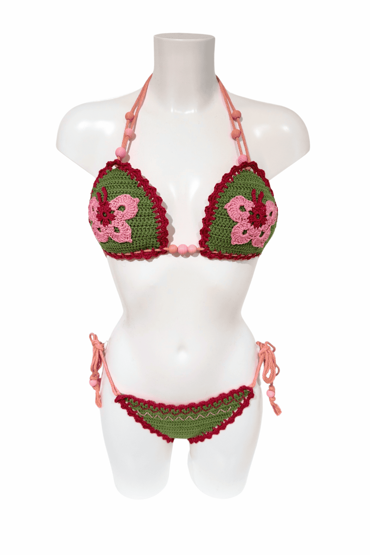 Green Pink Butterfly luxury crochet bikini, designed and handmade in Switzerland by RA LIVING – exclusive designer beachwear and swimwear for a stylish summer look.