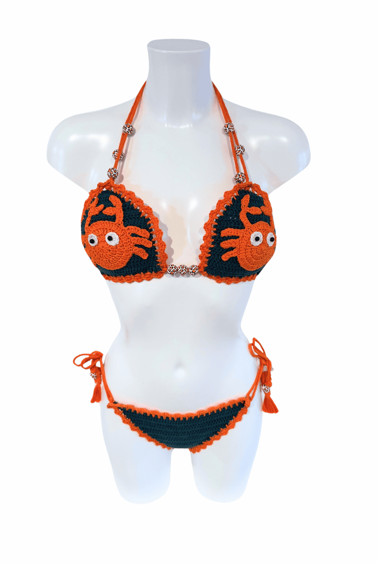 Orange Crab luxury crochet bikini, designed and handmade in Switzerland by RA LIVING – exclusive designer beachwear and swimwear for a stylish summer look.