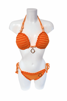 Orange Striped luxury crochet bikini, designed and handmade in Switzerland by RA LIVING – exclusive designer beachwear and swimwear for a stylish summer look.