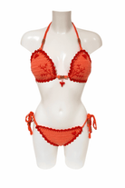 Orange Lobster luxury crochet bikini, designed and handmade in Switzerland by RA LIVING – exclusive designer beachwear and swimwear for a stylish summer look.
