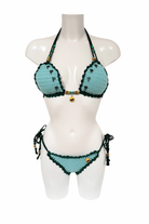Blue Green Palm Tree luxury crochet bikini, designed and handmade in Switzerland by RA LIVING – exclusive designer beachwear and swimwear for a stylish summer look.