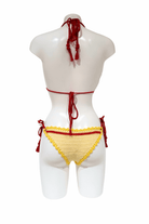 Yellow Red Balloon luxury crochet bikini, designed and handmade in Switzerland by RA LIVING – exclusive designer beachwear and swimwear for a stylish summer look.