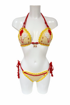 Red Yellow Balloon luxury crochet bikini, designed and handmade in Switzerland by RA LIVING – exclusive designer beachwear and swimwear for a stylish summer look.
