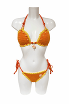 Orange Yellow Lollipop luxury crochet bikini, designed and handmade in Switzerland by RA LIVING – exclusive designer beachwear and swimwear for a stylish summer look.