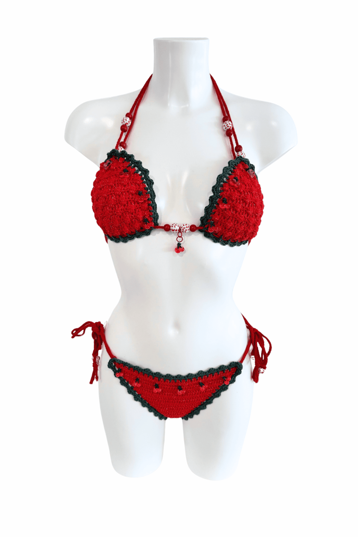 Red Cherry luxury crochet bikini, designed and handmade in Switzerland by RA LIVING – exclusive designer beachwear and swimwear for a stylish summer look.