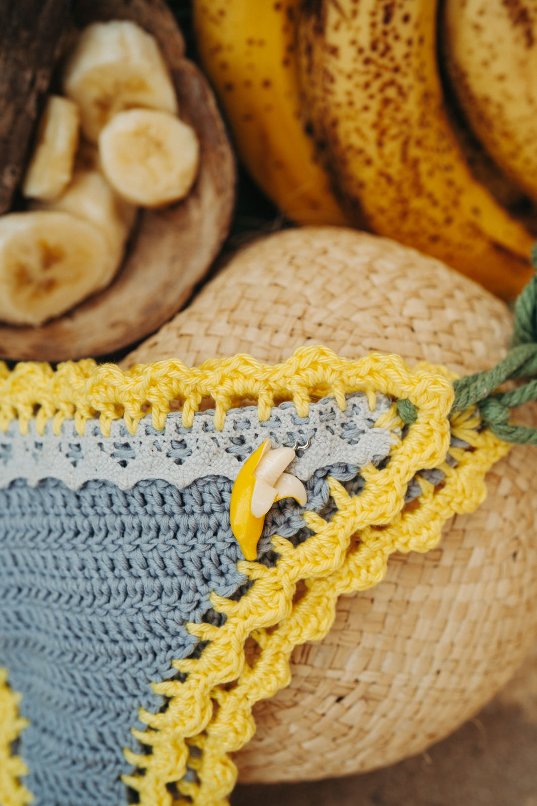 Grey Yellow Banana luxury crochet bikini, designed and handmade in Switzerland by RA LIVING – exclusive designer beachwear and swimwear for a stylish summer look.